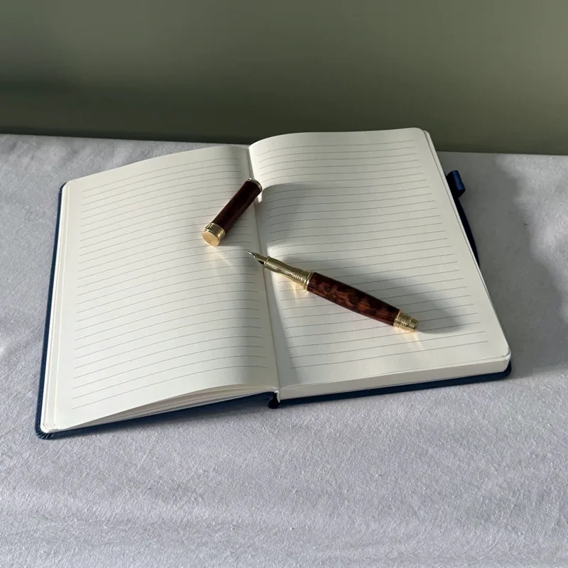Fountain Pen on an open notebook