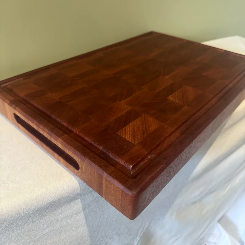 Sapele End Grain Chopping Board, 464mm, one of the handles
