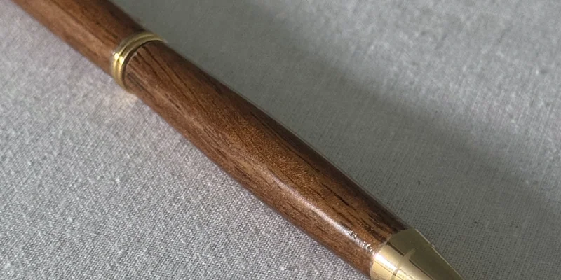 Close-up of a hand-turned pen in Iroko