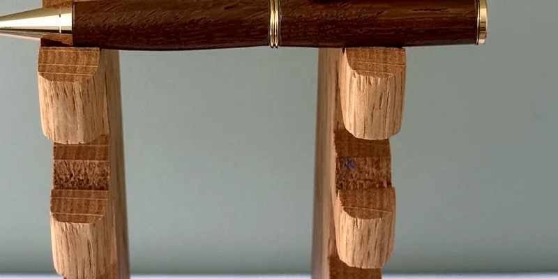 A hand-turned ballpoint pen in Iroko