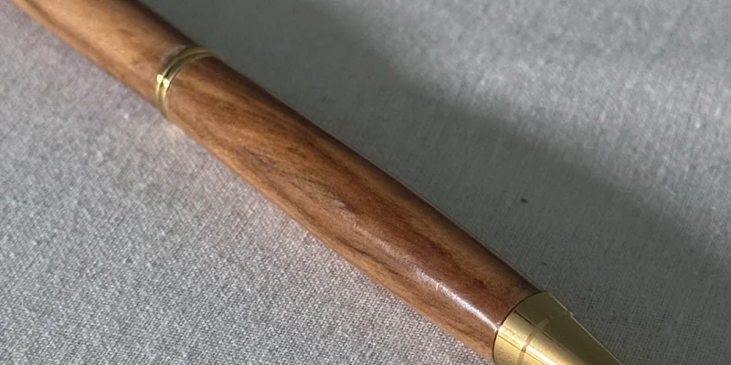 Close-up of a hand-turned pen in Olive